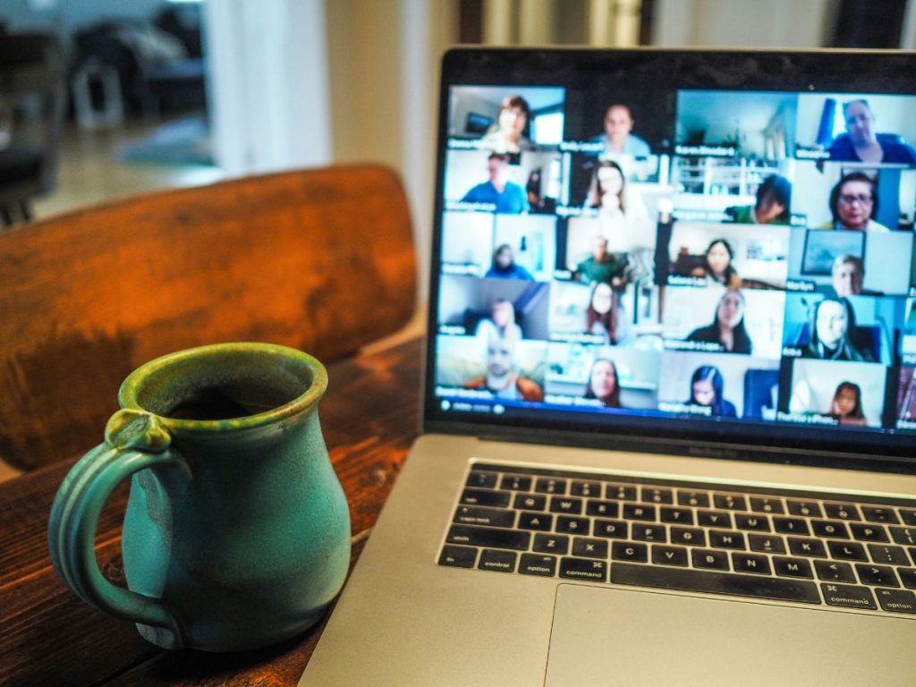 laptop and cup on table