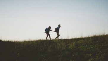 girl and boy walking uphill